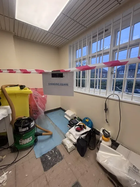 Asbestos floor tile and bitumen removal in Ealing